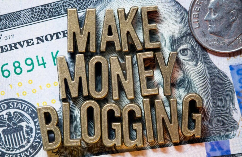 A picture of a money with the words make money blogging in gold. Keep reading to learn how to monetize your blog from day one.