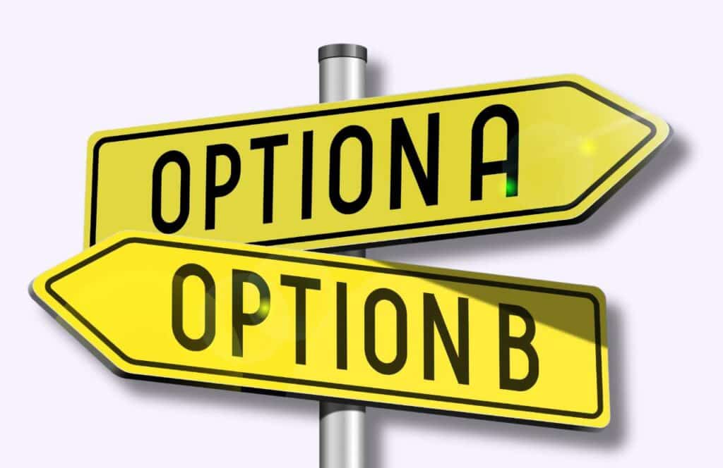 Two signs pointing in two different directions with the words "option A" and "option B." Learn more about conversion rate optimization for your blog.