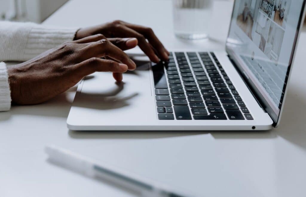 Black man working on home decor website to help build backlinks to blog