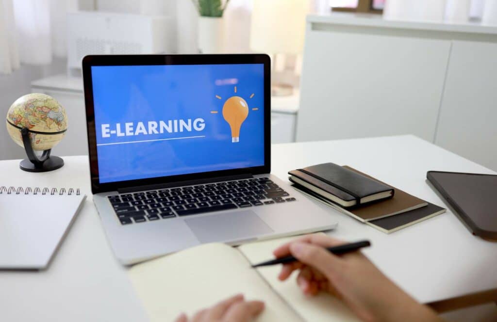 A laptop showing the screen of an e-learning platform that was created and sold on a blog. Keep reading to learn how to make money blogging.