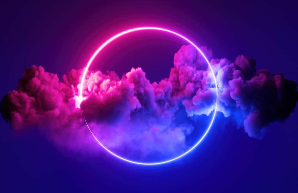 Pink and violet clouds on a dark background signifying the phrase if you build it they will come. Read more about how true this is for your business because content is king.